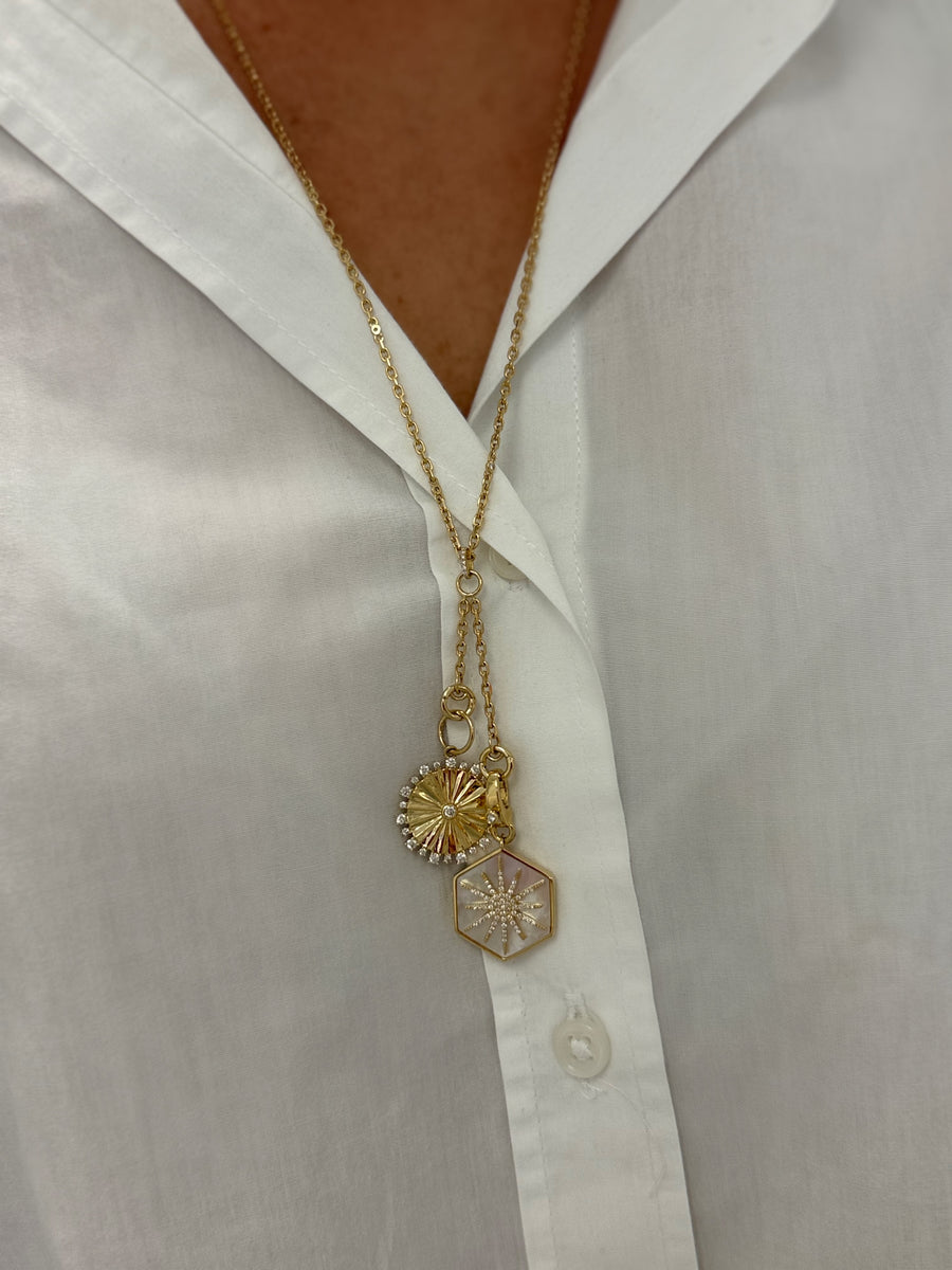 Small Fluted Gold Medallion with Surrounding Diamonds