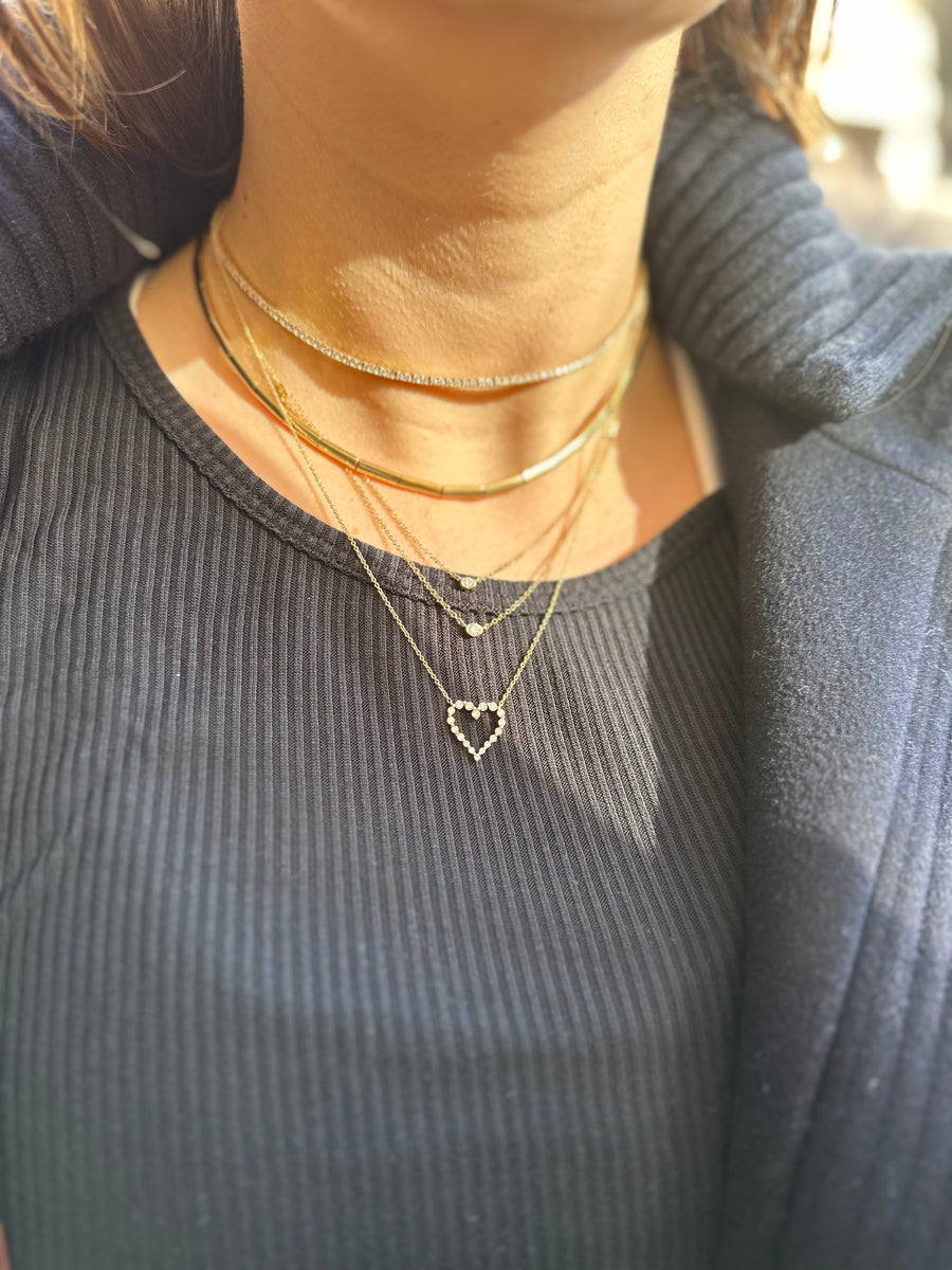Graduated Diamond Single Prong Heart Necklace